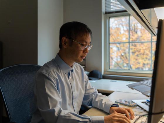 Xiao on computer in office 